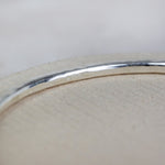 sterling silver thick hammered statement bangle handmade by Lucy Kemp Jewellery