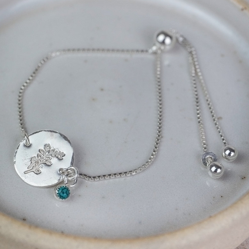 sterling silver hand stamped birth month flower and birthstone cluster bracelet handmade by Lucy Kemp Jewellery - December - Holly with Turquoise image