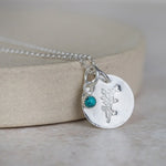 sterling silver hand stamped birth month flower with semi precious birthstone cluster pendant handmade by Lucy Kemp Jewellery - December - holly with turquoise image