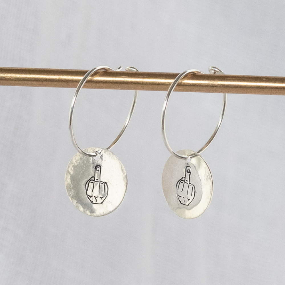 Sterling silver middle finger stamped charm hoops by Lucy Kemp Jewellery 