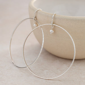 
                  
                    Sterling Silver Celestial Hoop Earrings with Pearls
                  
                