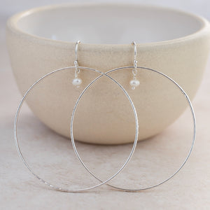 
                  
                    Sterling Silver Celestial Hoop Earrings with Pearls
                  
                