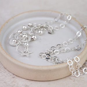 
                  
                    Sterling Silver Charm Necklace
                  
                