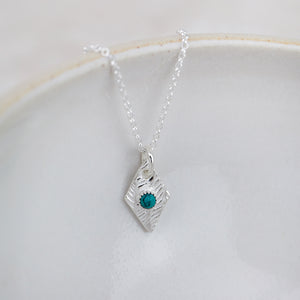 
                  
                    Sterling Silver Diamond with Turquoise Pendant
                  
                