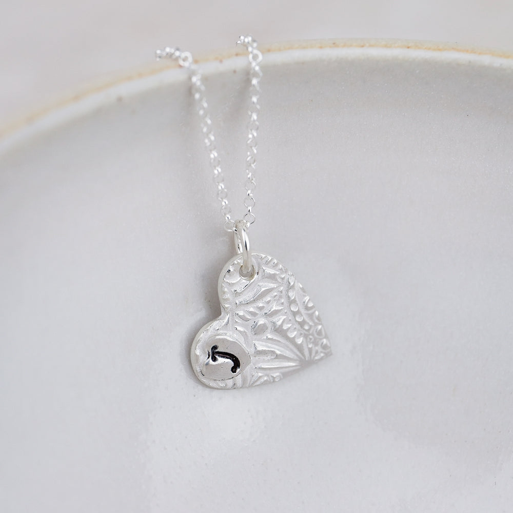 
                  
                    Sterling Silver Textured Double Heart Pendant
                  
                