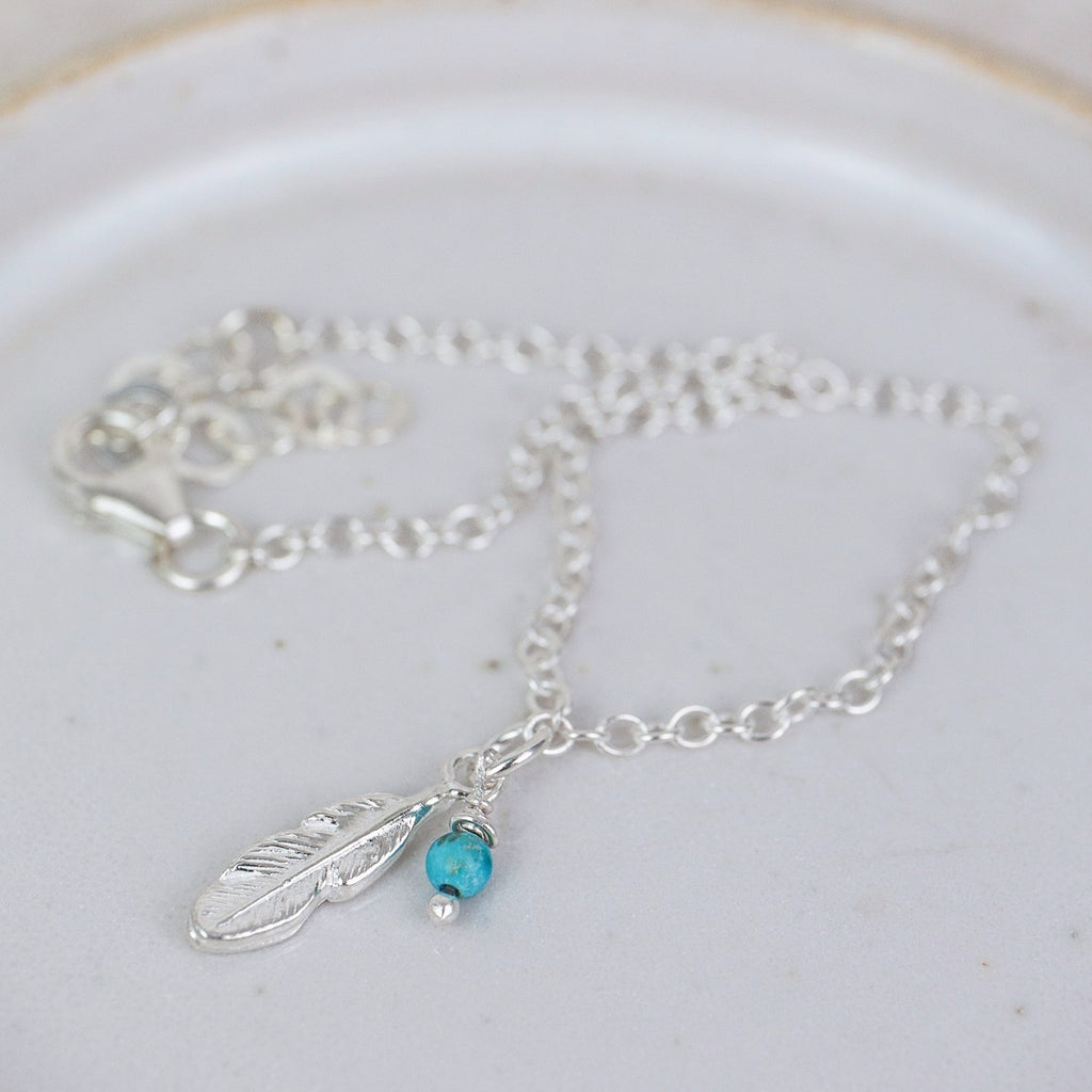 sterling silver feather bracelet with turquoise