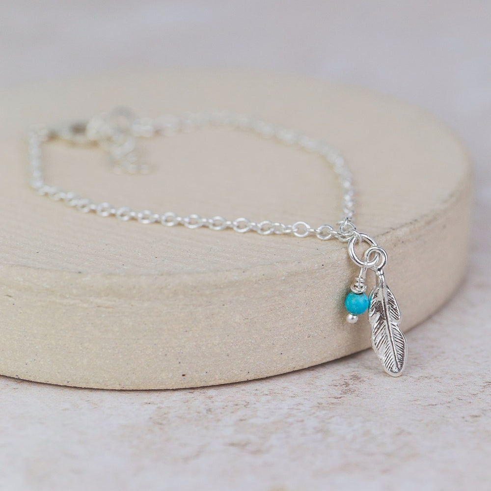 sterling silver feather bracelet with turquoise