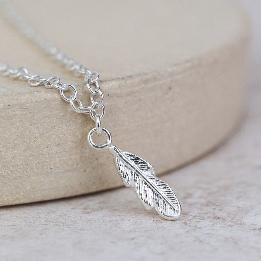 
                  
                    Sterling Silver Feather Charm Anklet
                  
                