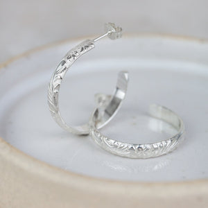 
                  
                    Sterling Silver Floral Hoop Earring
                  
                