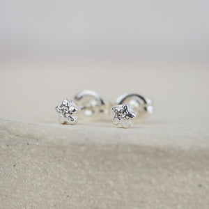 
                  
                    Sterling Silver Mini Studs Flower
                  
                