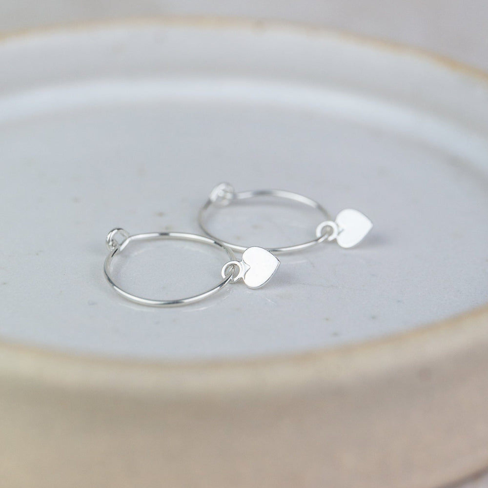 
                  
                    Sterling Silver Charm Hoops with Heart Charm
                  
                