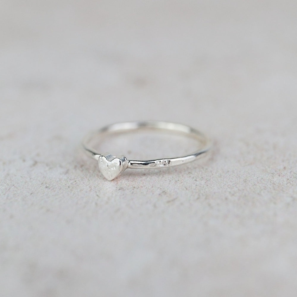 
                  
                    Sterling Silver Mini Charm Heart Ring
                  
                