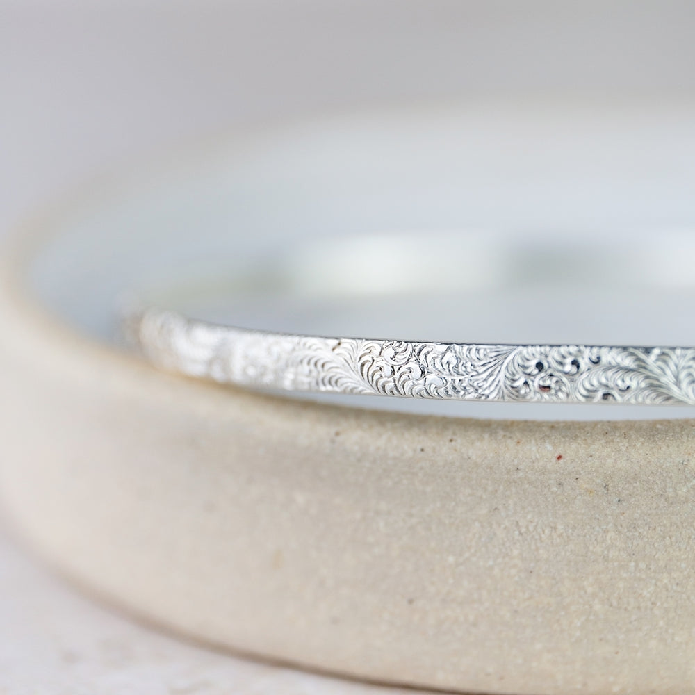 
                  
                    Sterling Silver Lace Texture Bangle
                  
                