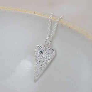 
                  
                    Sterling Silver Textured Long Heart Pendant
                  
                