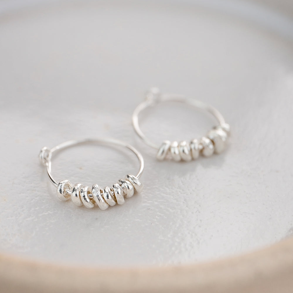 
                  
                    Sterling Silver Nugget Hoops
                  
                