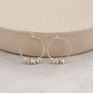 
                  
                    Sterling Silver Nugget Hoops
                  
                