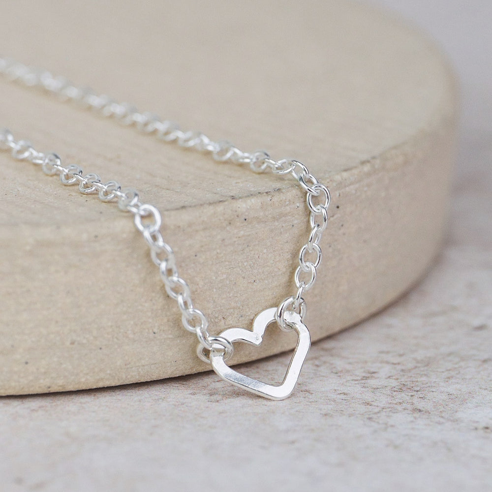 
                  
                    Sterling Silver Open Heart Charm Anklet
                  
                
