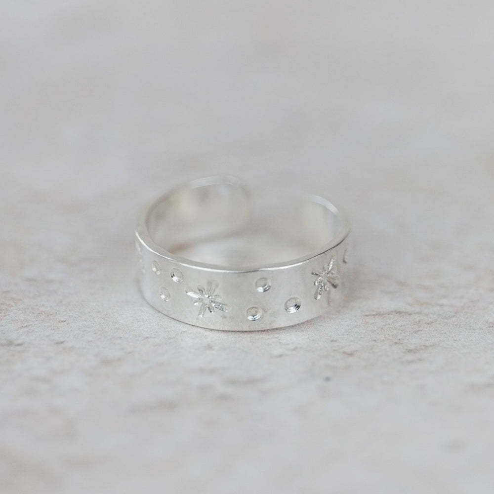 sterling silver hand stamped celestial star burst toe ring handmade by Lucy Kemp Jewellery