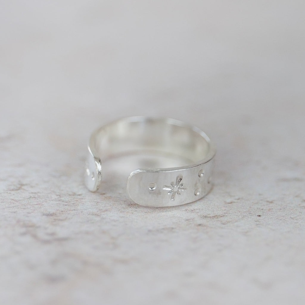 sterling silver hand stamped celestial star burst toe ring handmade by Lucy Kemp Jewellery