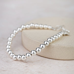 
                  
                    Sterling Silver Bead Bracelet
                  
                