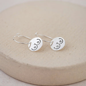 
                  
                    Sterling Silver Large Charm Hoops with Boobs
                  
                