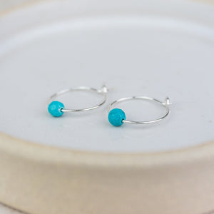 
                  
                    Sterling Silver Charm Hoops with Turquoise Bead
                  
                