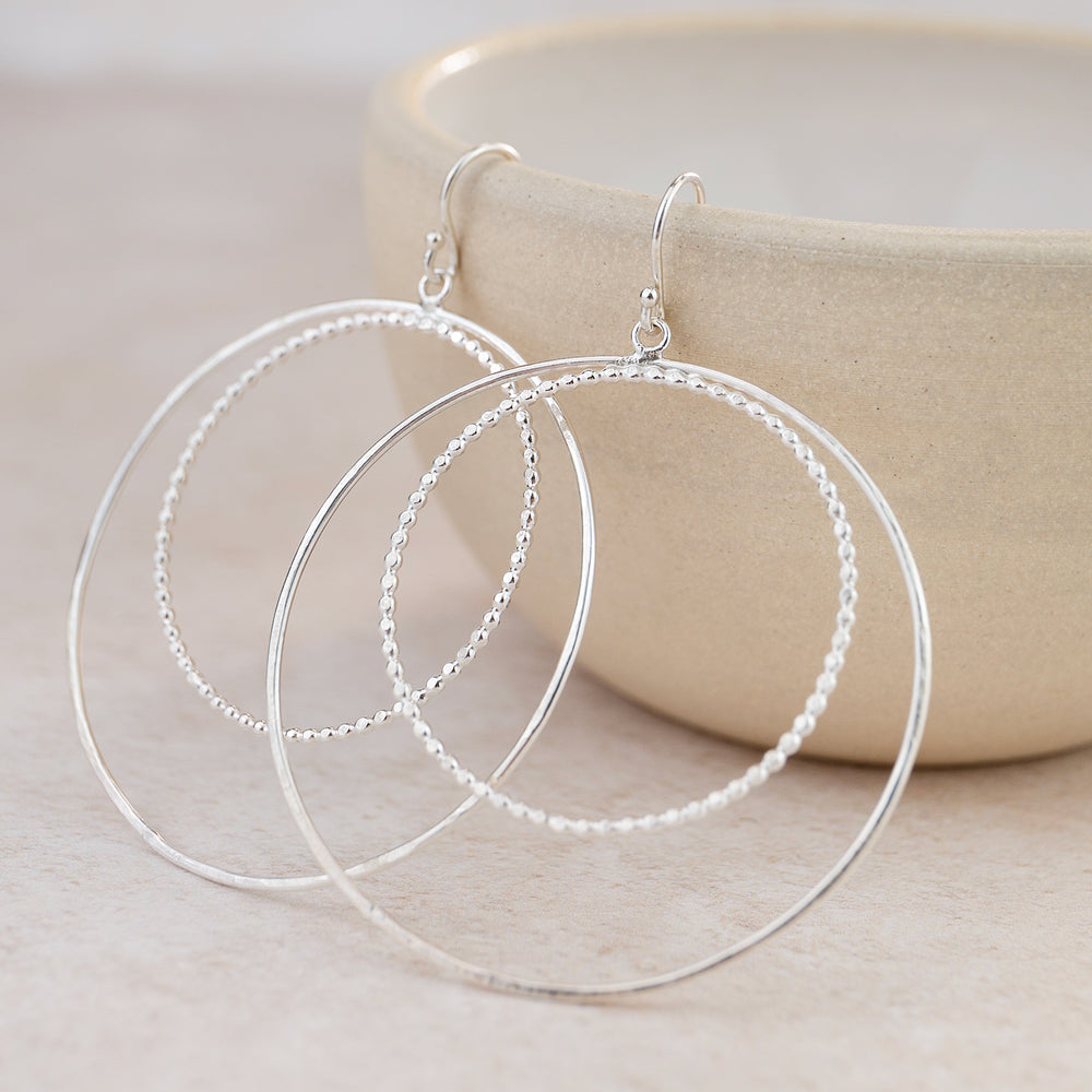 
                  
                    Sterling Silver Two Circle Hoop Earrings
                  
                