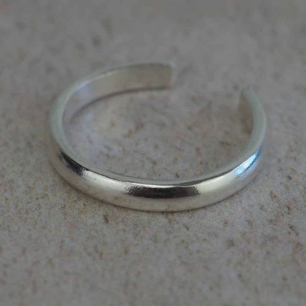 skinny sterling silver hammered toe ring by Lucy Kemp Jewellery