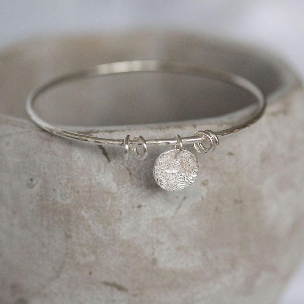 sterling silver textured circle charm bangle handmade by Lucy Kemp Jewellery