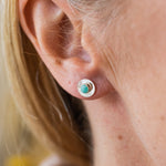 Worn Amazonite and sterling silver birthstone small disc studs by Lucy Kemp Jewellery
