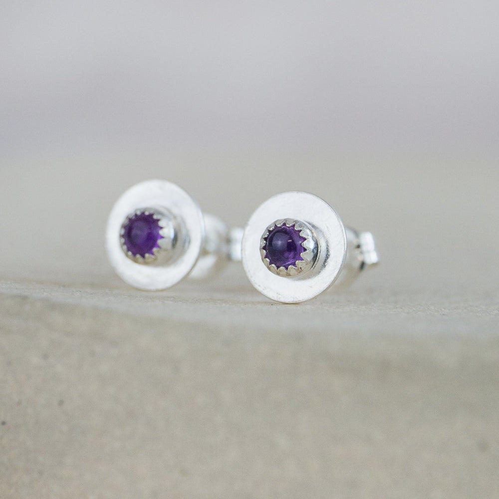 
                  
                    Amethyst and sterling silver birthstone small disc studs by Lucy Kemp Jewellery
                  
                