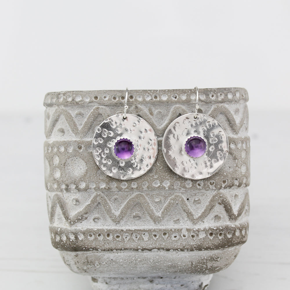 
                  
                    Sterling silver statement shield earrings with semi precious stones Amethyst handmade by Lucy Kemp Jewellery
                  
                
