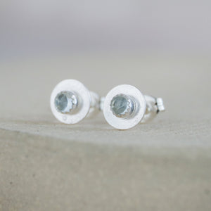 
                  
                    Aquamarine and sterling silver birthstone small disc studs by Lucy Kemp Jewellery
                  
                
