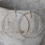 Sterling silver and rose quartz celestial hoop earrings by Lucy Kemp Jewellery