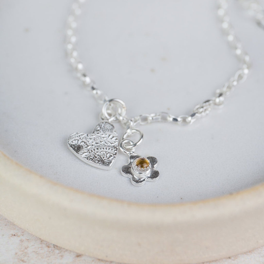 sterling silver and citrine heart and flower birthstone cluster bracelet handmade by Lucy Kemp Jewellery - citrine
