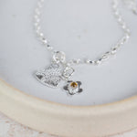 sterling silver and citrine heart and flower birthstone cluster bracelet handmade by Lucy Kemp Jewellery - citrine