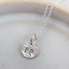 sterling silver personalised zodiac dinky pendant by Lucy Kemp Jewellery