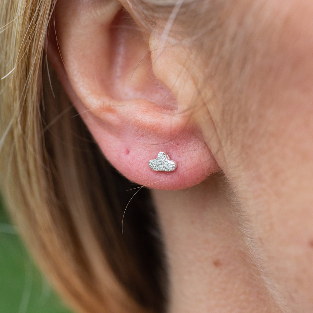 mini cloud sterling silver stud worn, by Lucy Kemp Jewellery 