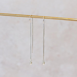 
                  
                    sterling silver teardrop charm threader earrings handmade by Lucy Kemp Jewellery 
                  
                
