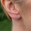 sterling silver textured mini diamond studs worn, handmade by Lucy Kemp Jewellery