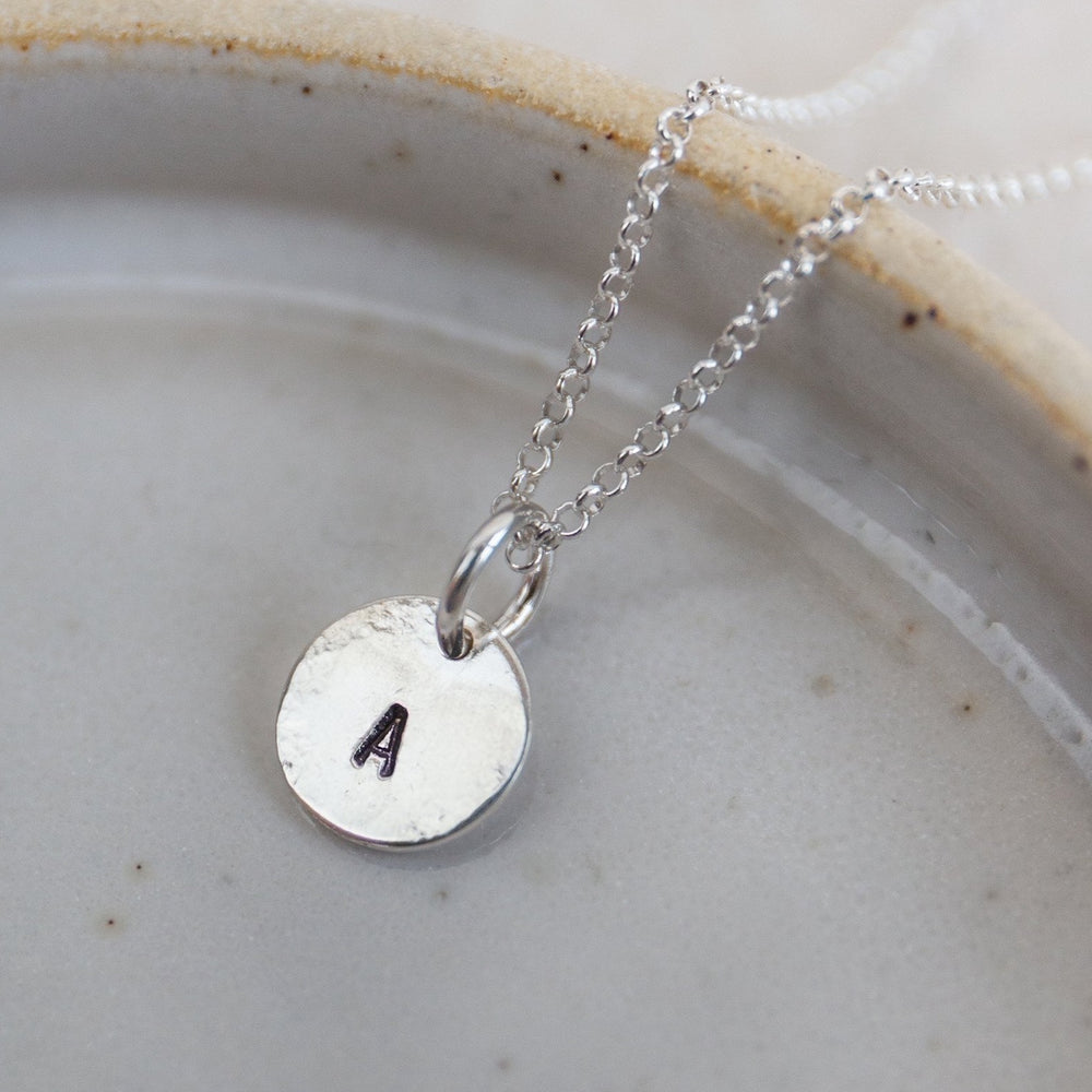 Sterling silver dinky initial personalised necklace from Lucy Kemp Jewellery