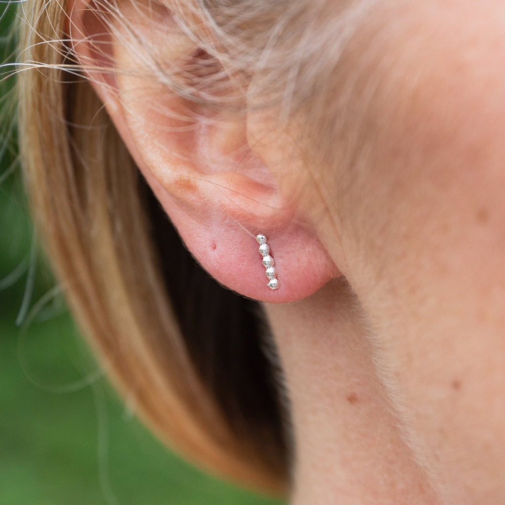 sterling silver mini dotty stick stud worn, handmade by Lucy Kemp Jewellery 