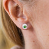 Worn Emerald CZ (SYN) and sterling silver birthstone small disc studs by Lucy Kemp Jewellery