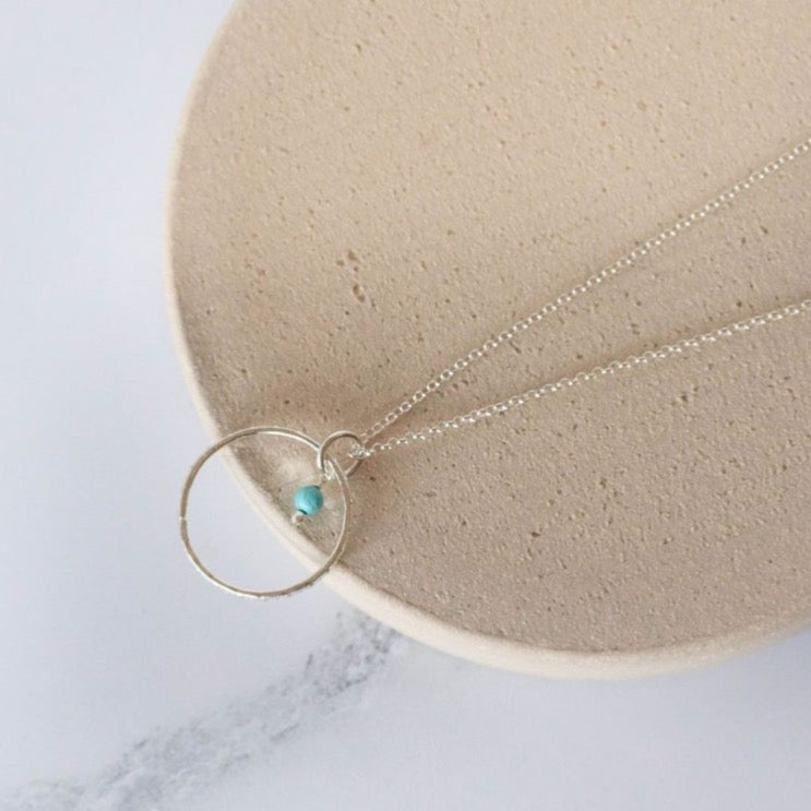 sterling silver and turquoise celestial hoop pendant by Lucy Kemp Jewellery , perfect something blue jewellery