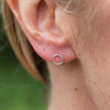 sterling silver mini geo circle studs worn, handmade by Lucy Kemp Jewellery