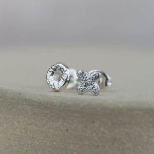 
                  
                    sterling silver textured mini hugs and kisses studs OX
                  
                