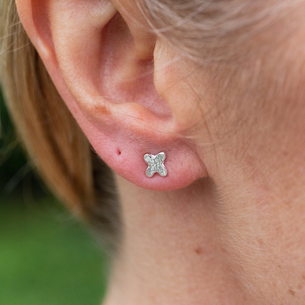 sterling silver textured mini hugs and kisses studs OX, Kiss worn, by Lucy Kemp Jewellery 