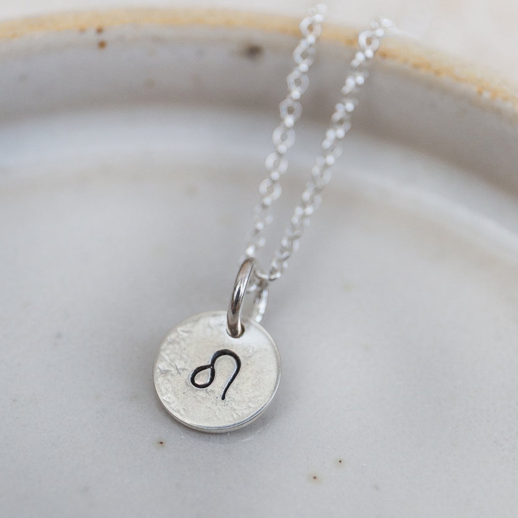 sterling silver personalised zodiac dinky pendant by Lucy Kemp Jewellery