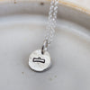 sterling silver personalised zodiac dinky pendant by Lucy Kemp Jewellery