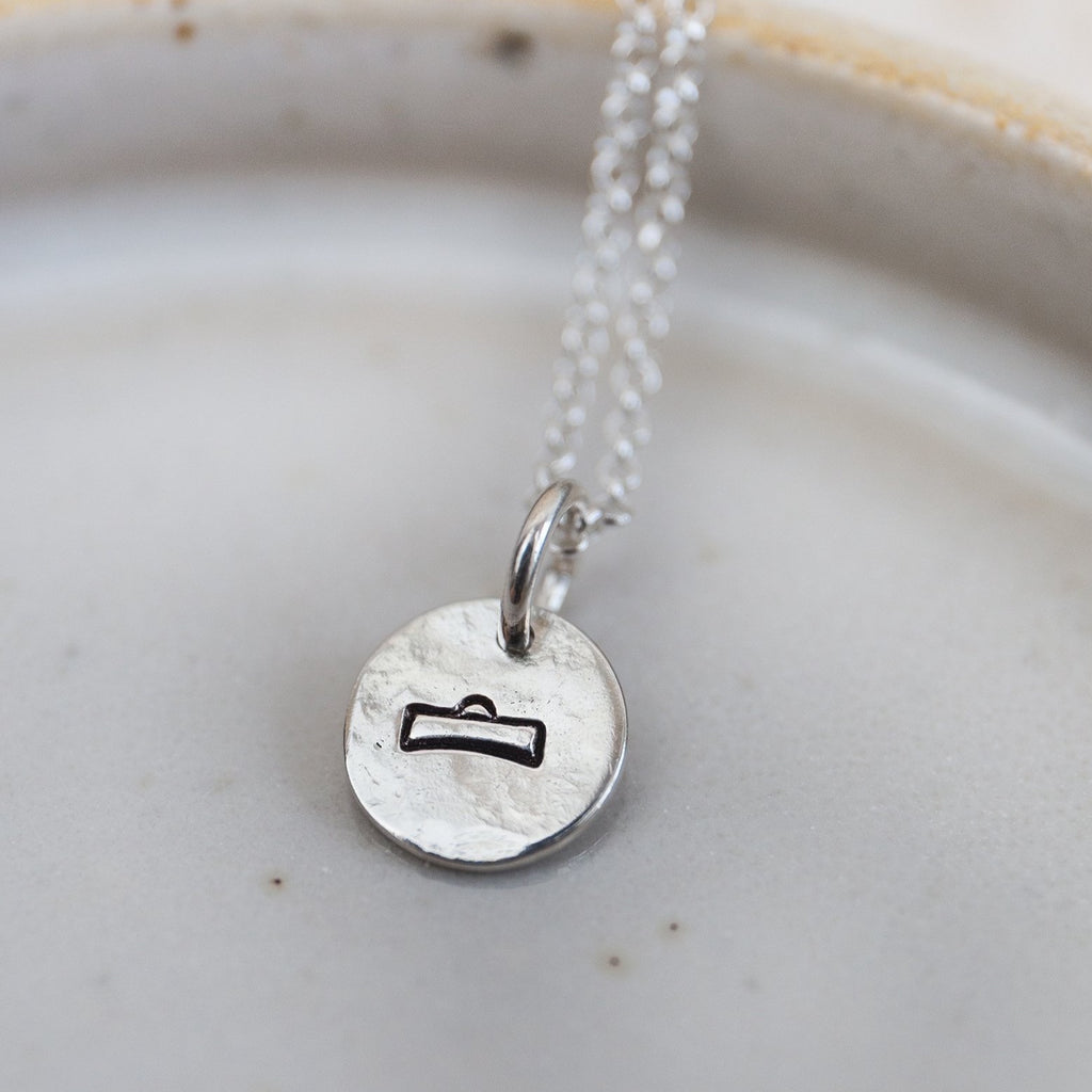 sterling silver personalised zodiac dinky pendant by Lucy Kemp Jewellery